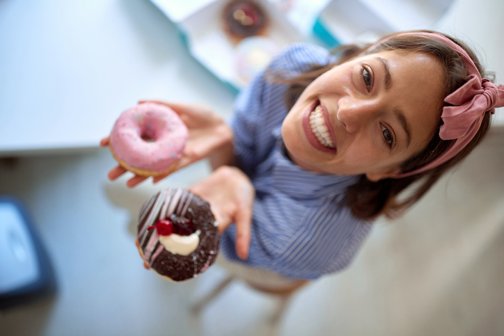 Small business owner is passionate about her yummy product/ donuts