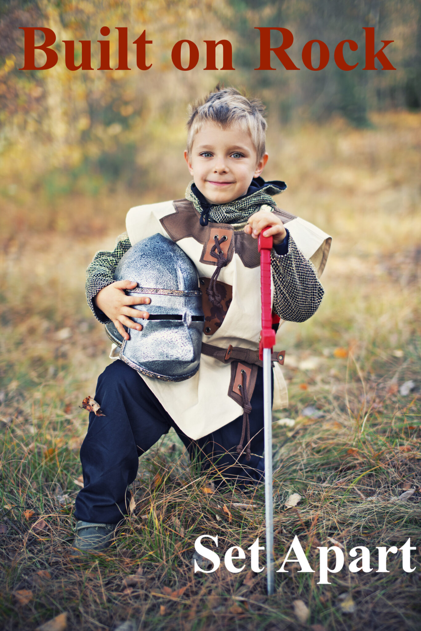Portrait of a brave little knight kneeling. The boy is 4 and is wearing knight's outfit.